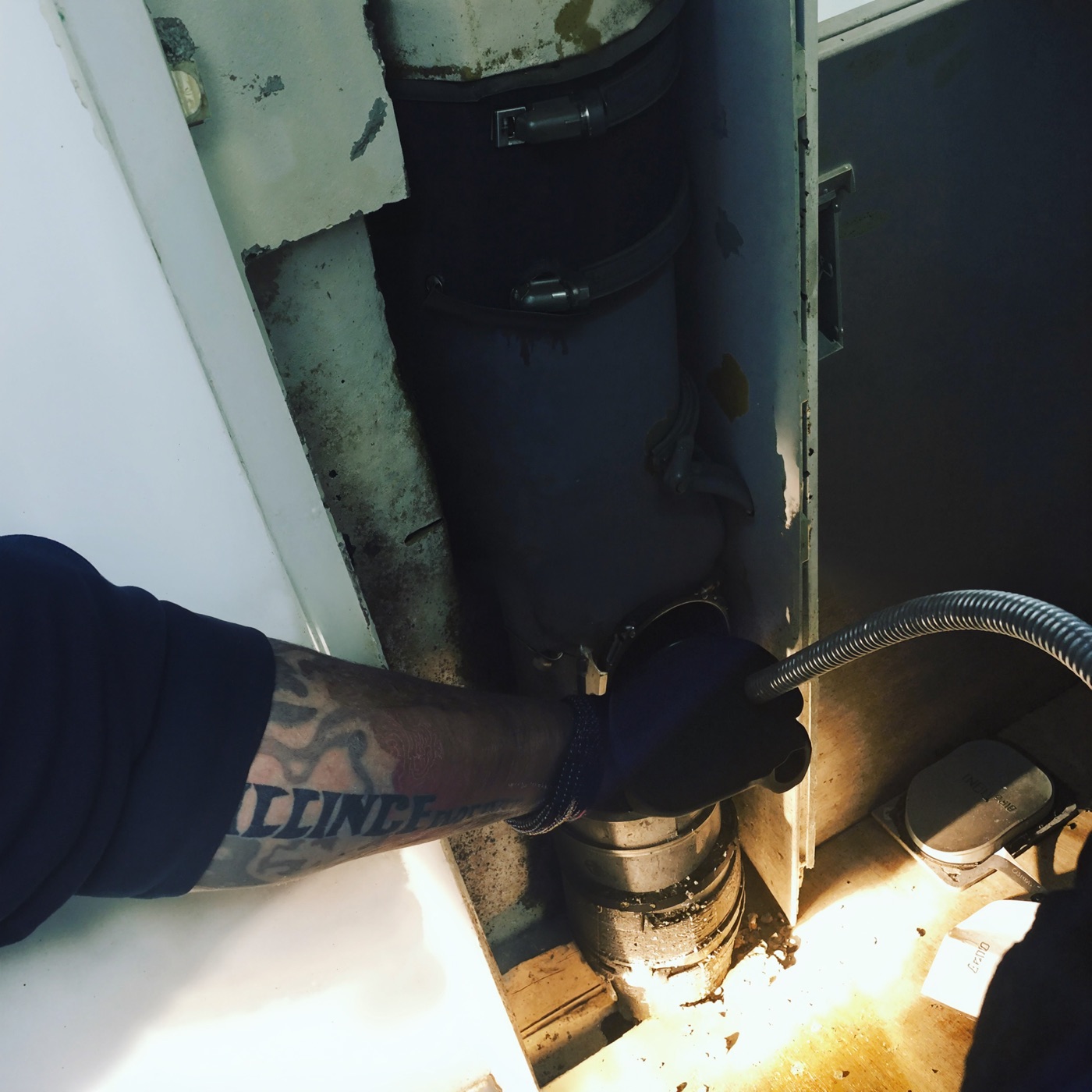 A1 engineer clearing a blocked drain